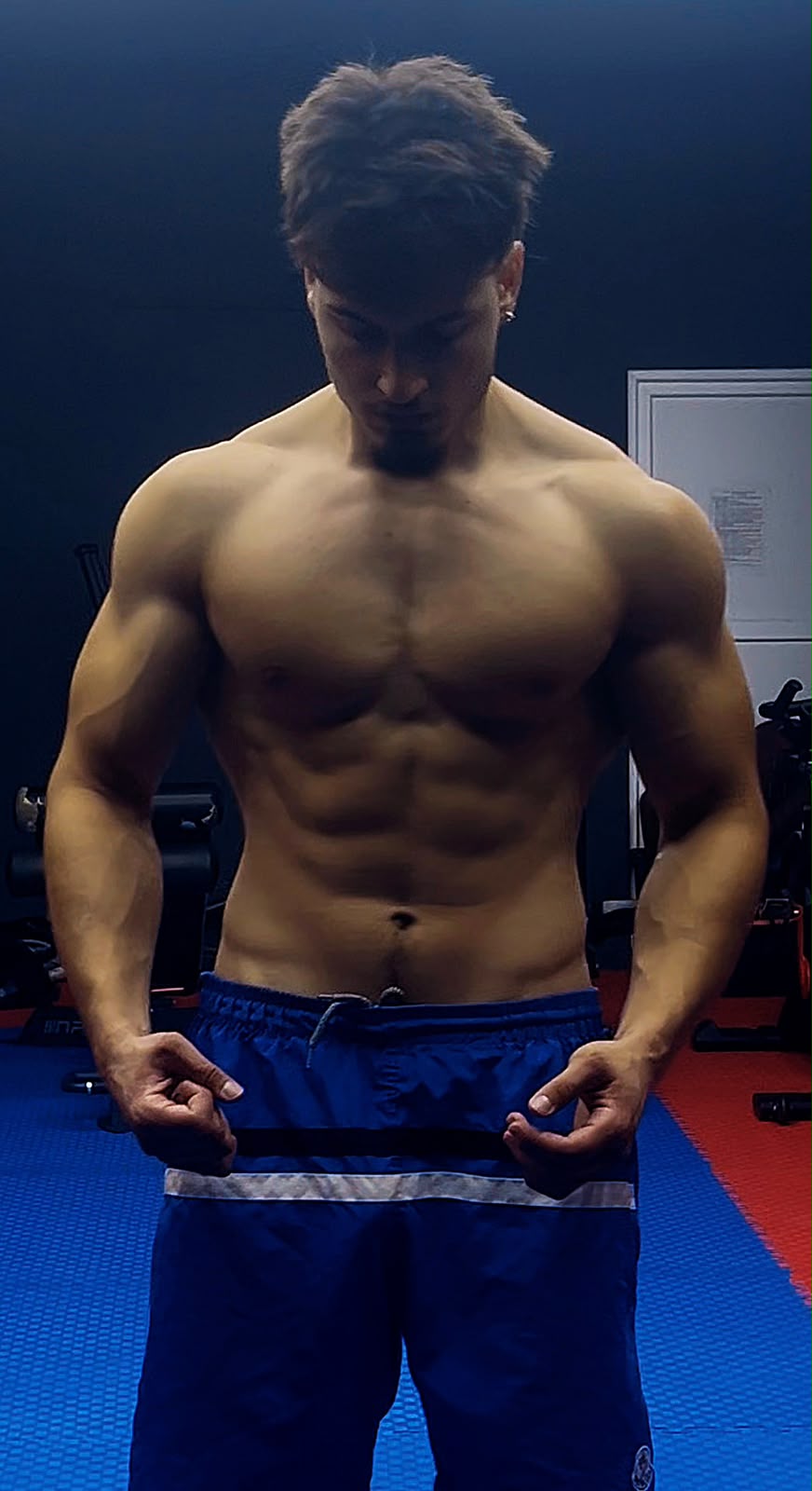 Personal trainer standing in a gym